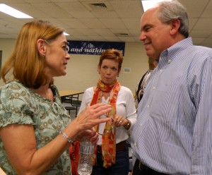 Warren Gooch, the Democratic candidate for Anderson County mayor, talks to Claxton residents Carol Brown and Kathy Martin after a Tuesday evening forum at Claxton Elementary School.