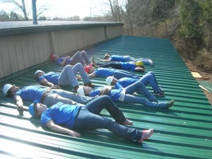 Students on Holiday Bureau Roof