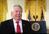 Tom Beehan at White House Podium