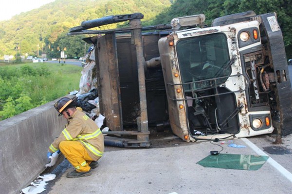 Waste Management Truck Overturns in Oliver Springs