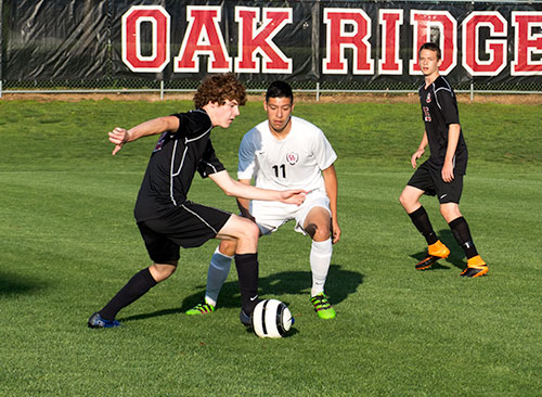 Oak Ridge senior forward Jose Rodriguez (11) plays defense against Maryville during a 4-1 loss for the Wildcats at home on Tuesday, May 3, 2016. (Photo by John Huotari/Oak Ridge Today)