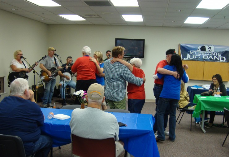 Rain brought the event inside, but the lively tunes of the Mt. LeConte Jug Band and an impromptu dance party brought a different kind of sunshine and warmth to the event. (Submitted photo courtesy MMC)