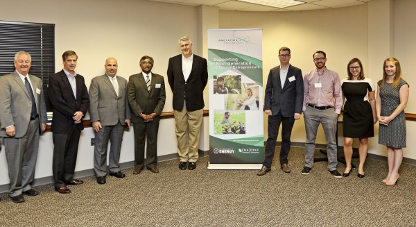 Pictured above during an Innovations Crossroads business accelerator announcement on Tuesday, Sept. 20, 2016, at the National Transportation Research Center in Hardin Valley are, from left, Tom Rogers, Charlie Brock, Moe Khaleel, Thomas Zacharia, Mark Johnson, Thomas McDonald, Philip Taynton, Johanna Wolfson, and Beth Papanek. (Photo courtesy ORNL)