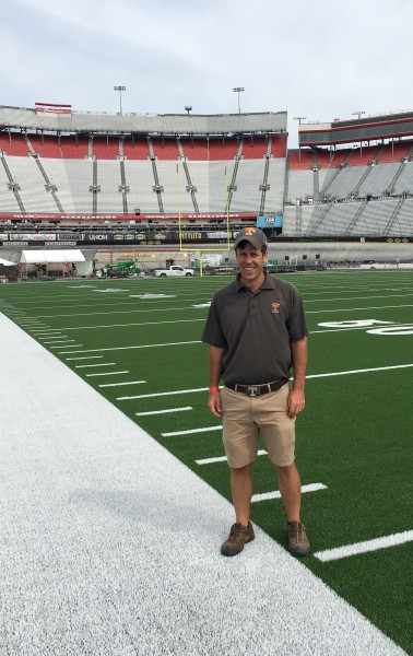 Kyley Dickson tests the field at Bristol Motor Speedway before the Battle at Bristol, the record-setting football game between Tennessee and Virginia Tech. (Photo courtesy Roane State)