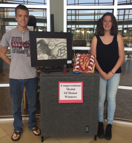 Oak Ridge High School students Katie Roach, right, and Asher Chance recently took first and second place in The Congressional Medal of Honor Student Art Contest. (Submitted photo)