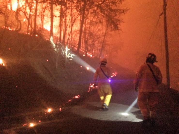 Oak Ridge Fire Department Captain Jordon Alcorn, left, and Firefighter James Jordain, right, hiking up the road to the trapped victims. (Photo by Oak Ridge Fire Chief Darryl Kerley)