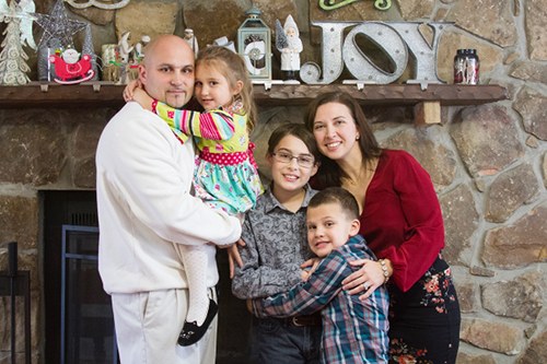 AJ Cucksey is pictured above with his family, including father John, left; mother, Shannon, right; and sister Gia. (Photo courtesy Shannon Cucksey)