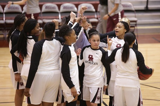 The Oak Ridge Lady Wildcats huddle before a 62-56 win over Bearden in a Region 2-AAA quarterfinal elimination game at Wildcat Arena on Friday, Feb. 24, 2017. (Photo by Luther Simmons)