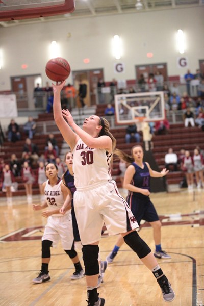 Oak Ridge junior Destiny Kassner (30) shoots the basketball during a 48-47 Region 2-AAA semifinal win over William Blount at Wildcat Arena on Monday, Feb. 27, 2017. (Photo by Luther Simmons)