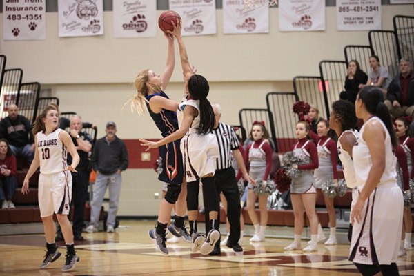 Oak Ridge sophomore Jada Guinn (24) tries to block a William Blount shot during a 48-47 Region 2-AAA semifinal win for the Lady Wildcats at Wildcat Arena on Monday, Feb. 27, 2017. (Photo by Luther Simmons)