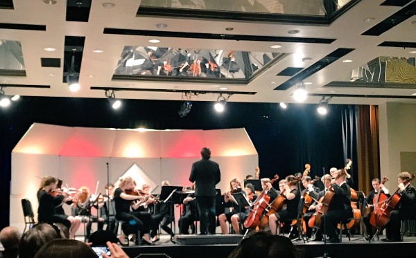 The Oak Ridge High School 9th grade Orchestra performs at Festival Disney in Orlando, Florida, on Saturday, March 11, 2017. (Photo by Mike Mahathy)