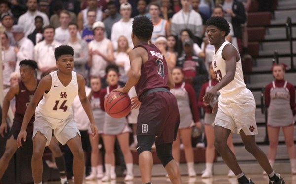 Oak Ridge sophomore Herbert Booker (14) and senior Anthony Gibson (23) play defense against Bearden sophomore Ques Glover (0) during an 86-73 win for the Wildcats in the Region 2-AAA basketball championship at Wildcat Arena on Thursday, March 2, 2017. (Photo by Luther Simmons)