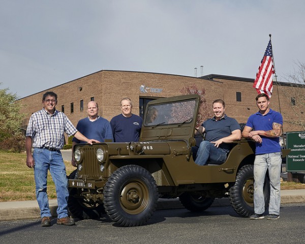A Jeep 3D printed at Oak Ridge National Laboratory's Manufacturing Demonstration Facility in Hardin Valley. Pictured above on Nov. 25, 2015, are, from left, Steve Whitted, Lonnie Love, Craig Blue, Brian Post, and Matt Sallas. (Photo courtesy of Oak Ridge National Laboratory, U.S. Dept. of Energy)