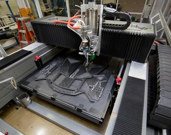 The Cincinnati Machine (a 3D printer) at work in Oak Ridge National Laboratory’s Manufacturing Demonstration Facility in Hardin Valley on Dec. 29, 2014. (Photo courtesy of Oak Ridge National Laboratory, U.S. Dept. of Energy)