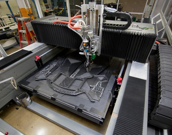 The Cincinnati Machine (a 3D printer) at work in Oak Ridge National Laboratoryâ€™s Manufacturing Demonstration Facility in Hardin Valley on Dec. 29, 2014. (Photo courtesy of Oak Ridge National Laboratory, U.S. Dept. of Energy)