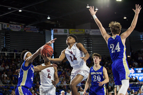 Oak Ridge sophomore Herbert Booker (14) drives against Brentwood during a 53-45 win for the Wildcats in a Class AAA boys' state quarterfinal game at Murphy Center in Murfreesboro on Wednesday, March 15, 2017. (Photo by Kindell Moore)