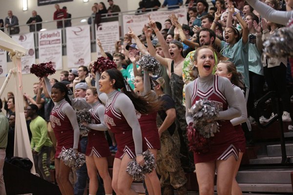Oak Ridge High School cheerleaders and students celebrate a 46-43 win over Maryville in a Region 2-AAA semifinal elimination game at Wildcat Arena on Tuesday, Feb. 28, 2017. (Photo by Luther Simmons)