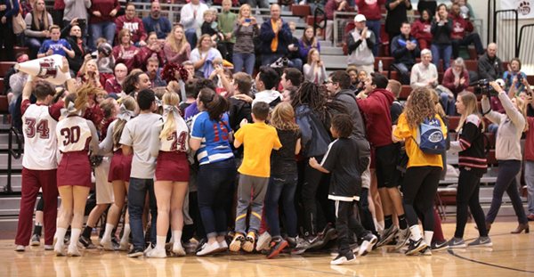 The Oak Ridge High School student section and cheerleaders celebrate the 61-44 Class AAA sectional win over Daniel Boone at Wildcat Arena on Saturday, March 4, 2017. (Photo by Luther Simmons)