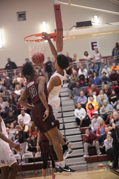 Oak Ridge senior Tajion Jones (3) dunks the basketball against Bearden during an 86-73 win for the Wildcats in the Region 2-AAA basketball championship at Wildcat Arena on Thursday, March 2, 2017. (Photo by Luther Simmons)