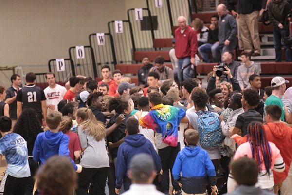 The Oak Ridge High School student section celebrates a 46-43 win over Maryville in a Region 2-AAA semifinal elimination game at Wildcat Arena on Tuesday, Feb. 28, 2017. (Photo by Luther Simmons)