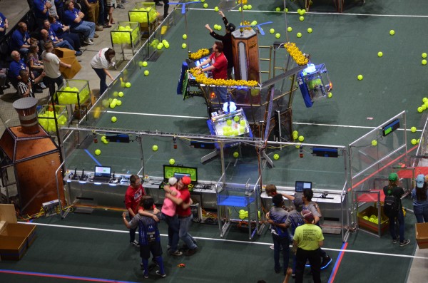 The Secret City Wildbots, Team 4265 of Oak Ridge, celebrate their second semifinals win to advance to the finals at the Smoky Mountain Regional in Knoxville on Saturday, March 25, 2017. (Photo by Angi Agle)