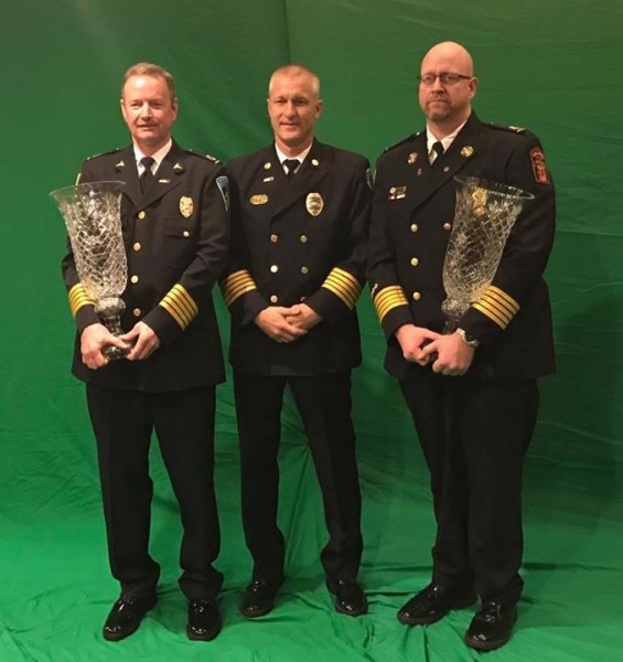 Rick Valentine, left, a 1990 graduate of Roane State's Paramedic Program and now director of the Sevier County Ambulance Service, along with Greg Miller, right, chief of the Gatlinburg Fire Department, were recently awarded the Tennessee Ambulance Service Association's President's Award. In middle is TASA President Andrew Reed. (Photo courtesy Roane State)