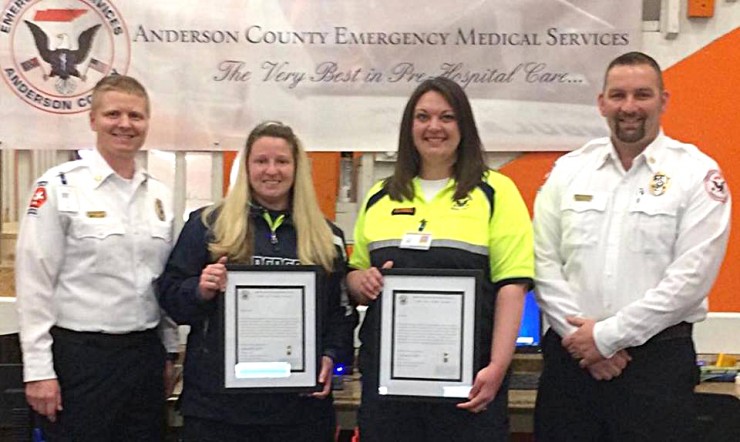 Nathan Sweet, left, director of the Anderson County EMS, and Danny McCreary, deputy director, are pictured with two other graduates of Roane State's Paramedic Program who were recently promoted to assistant supervisors, Carrissa Keathley, left, and Misti Smiddy. (Submitted photo)