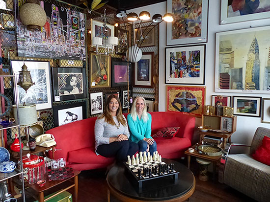 The second year of Arts & Antiques in the Square kicks off Saturday, April 29, in Jackson Square. Vendor spaces are available, and you can have items appraised at the kickoff. Pictured above are Linda Johnston, right, owner of Through the Looking Glass Antiques and Collectibles and Meghan O'Neal of Southern Bliss Boutique. (Photo by John Huotari/Oak Ridge Today)