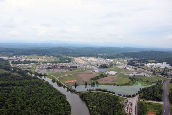 The East Tennessee Technology Park, now known as Heritage Center in west Oak Ridge, is pictured above in this aerial photo from 2015. The large building that extends from left to right at left-center is the former K-27 Building, where demolition work was completed in August 2016. (Photo courtesy CROET)