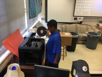 A photo from a grant award last year for a 3D printer for Robertsville Middle School. (Submitted photo)
