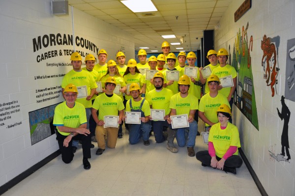 Students from three Morgan County high schools receive certificates after completing 40-hour HAZWOPER training. Also pictured are Joseph Miller, Director of the Morgan County Career and Technical Center, and Sarah Seavers, counselor. (Photo by UCOR)