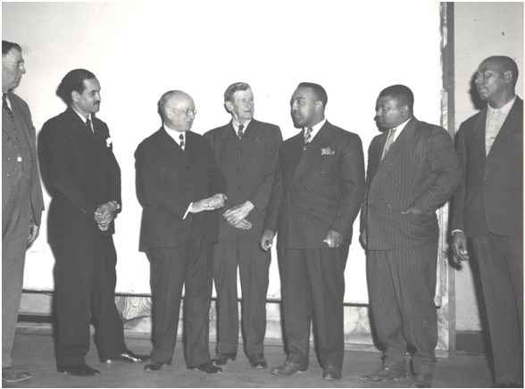 Pictured above is Henry Teasley, third from right, and other businessmen in the Scarboro community. Help is needed to identify the others. (Submitted photo)