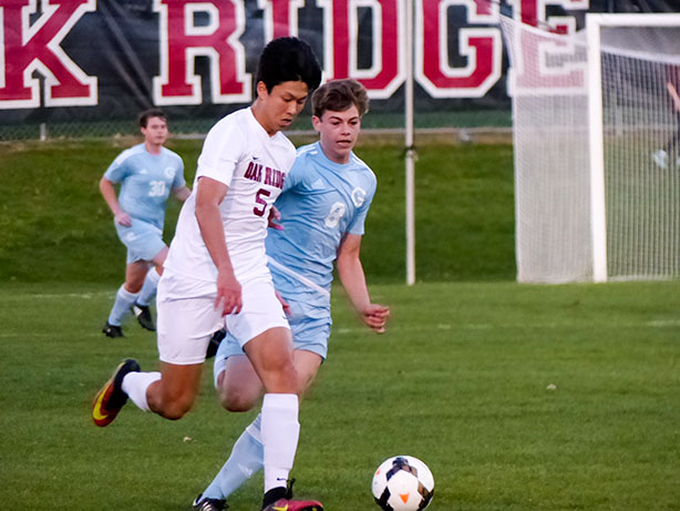 Masa Kato (5) of Oak Ridge and Curtis Russell (8) of Gibbs battle for the soccer ball during a 5-0 win for the Wildcats at the Oak Ridge Soccer Complex on Tuesday, April 4, 2017. (Photo by John Huotari/Oak Ridge Today) 