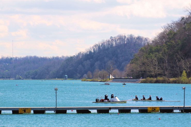 Rowers are pictured above on the Oak Ridge rowing course in the spring of 2017. The area that needed work to recently add the eighth lane is pictured at center-right along Melton Lake Drive. (Photo courtesy City of Oak Ridge)