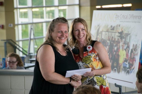 Oak Ridge Public Schools Education Foundation Executive Director Jessica Steed awards a grant to teacher Lisa Buckner. (Photo courtesy ORPSEF)