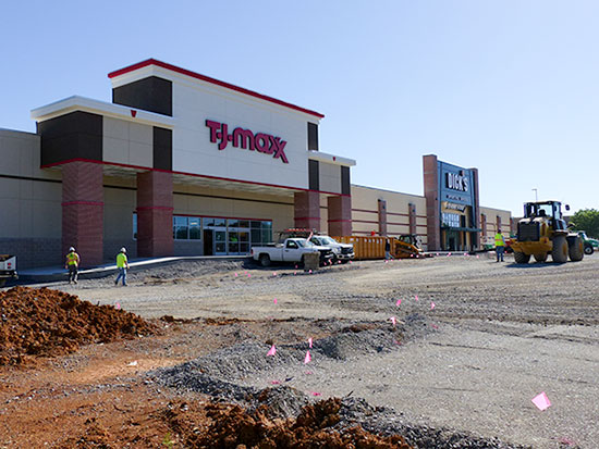 Eight new stores at Main Street Oak Ridge could be turned over to retailers by the end of June, a city consultant said Tuesday, May 2, 2017. Under construction above are the new Dick's Sporting Goods and T.J. Maxx stores. These are the entrances closest to South Illinois Avenue. The U.S. Post Office is to the left, and Walmart is to the right. (Photo by John Huotari/Oak Ridge Today)