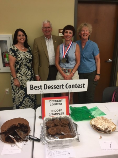Melanie Fillauer, second from right, is the grand prize winner in the Agape House chocolate contest. With her are the contest judges, from left, Jeanne Gorman, Kelly Callison, and Elaine Graham. (Submitted photo)