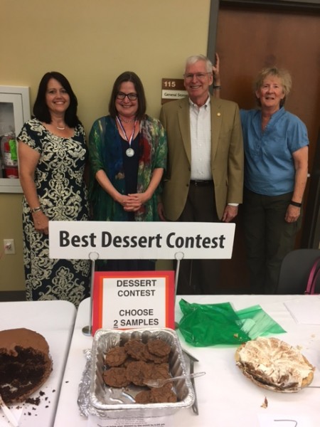 Rebecca Bowman, second from left, won second place in the Agape House chocolate contest. Contest judges, from left, are Jeanne Gorman, Kelly Callison, and Elaine Graham. (Submitted photo)