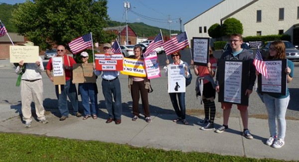 Protesters express their opposition to the health care vote in May by U.S. Representative Chuck Fleischmann, a Tennessee Republican, during a ribbon-cutting ceremony at the Rocky Top post office on May 9, 2017. (Photo by John Huotari/Oak Ridge Today)