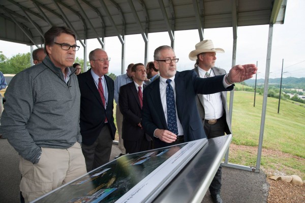 Jay Mullis, front center, acting manager of the U.S. Department of Energy's Oak Ridge Office of Environmental Management, talks about federal site cleanup work in Oak Ridge during a visit by Energy Secretary Rick Perry, left, on Monday, May 22, 2017. Pictured between Perry and Mullis are U.S. Sen. Lamar Alexander and Rep. Chuck Fleischmann, both Tennessee Republicans. (Photo by DOE)