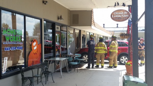 A vehicle crashed into two businesses in Jackson Square on Sunday, Aug. 20, 2017, causing interior and exterior damage, authorities said. (Photo by Daniel Powers)