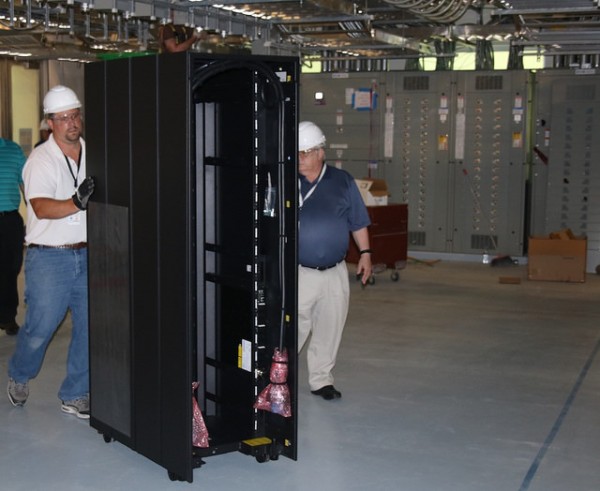 The first cabinets for the new Summit supercomputer at Oak Ridge National Laboratory arrived on Monday, July 31, 2017. (Photo courtesy ORNL's Oak Ridge Leadership Computing Facility. See creative commons license here.)