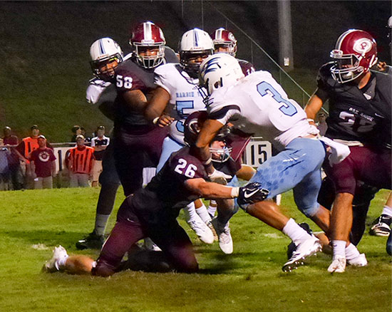 Hardin Valley senior running back Aaron Dykes (3) rushed for two touchdowns during a 21-20 loss to Oak Ridge on Blankenship Field on Friday, Aug. 18, 2017. Oak Ridge sophomore Jack Replogle (26) goes for the tackle above. (Photo by John Huotari/Oak Ridge Today)