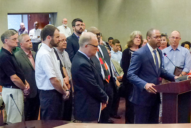 Reacting to the deadly violence at a white nationalist rally in Charlottesville, Virginia, this past weekend, Oak Ridge faith leaders on Monday, Aug. 14, 2017, condemned white supremacy, racism, anti-semitism, and other forms of hatred, and they asked the Oak Ridge City Council to adopt a resolution expressing similar sentiments. The statement of condemnation was read by Derrick Hammond, pastor of Oak Valley Baptist Church. (Photo by John Huotari/Oak Ridge Today)