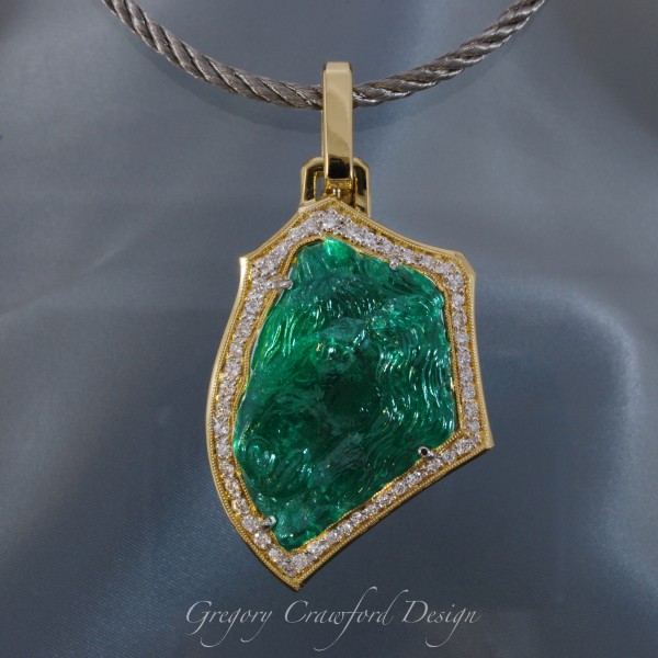 Gem hunter Gary Bowersox had this pendant created from a 70-carat Afghanistan emerald, a showpiece at the Karen’s Jewelers gem show Sept. 21-23, 2017. (Submitted photo)