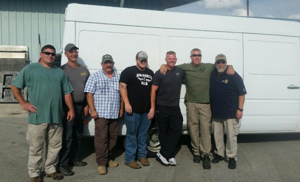 Clinton Police Department Detective Sergeant Bob Suarez, far right, a K9 trainer, left for Florida on Wednesday, Sept. 6, 2017. Suarez and K9 handlers from Knox and Loudon County are helping authorities in Miami relocate 35 K9s that are possibly in the path of Hurricane Irma. The dogs will be brought back to Tennessee and sheltered until the storm passes by. (Photo courtesy Clinton Police Department on Facebook)
