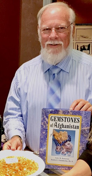Gary Bowersox displays his book, "Gemstones of Afghanistan." (Submitted photo) 
