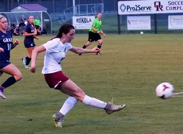 Pictured above during a 3-1 win over Grace Christian at Oak Ridge High School on Tuesday, Aug. 29, 2017, is sophomore Katie O'Brien (25). (Photo by John Huotari/Oak Ridge Today)