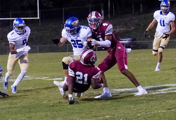 Oak Ridge sophomore running back Tyrell Romano (21) falls to the ground as senior wide receiver Caleb Martin (4) blocks during a 49-3 homecoming win for the Wildcats on Blankenship Field on Friday, Sept. 29, 2017. (Photo by John Huotari/Oak Ridge Today)