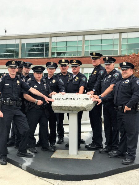 Oak Ridge police officers are pictured above at the 9/11 memorial at Oak Ridge High School on Sept. 11, 2017. (Photo courtesy Oak Ridge Schools)